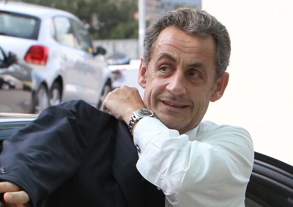 Nicolas Sarkozy arrive à l'hôtel Fairmont Monte-Carlo à Monaco le 18 juin 2014 où il donne une conférence lors du Deloitte World Meet.