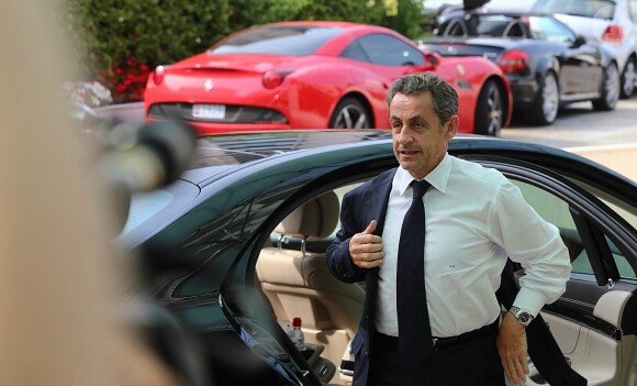 Nicolas Sarkozy arrive à l'hôtel Fairmont Monte-Carlo à Monaco le 18 juin 2014 où il donne une conférence lors du Deloitte World Meet.