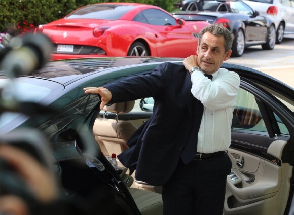 Nicolas Sarkozy arrive à l'hôtel Fairmont Monte-Carlo à Monaco le 18 juin 2014 où il donne une conférence lors du Deloitte World Meet.