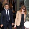 Nicolas Sarkozy et sa femme Carla Bruni-Sarkozy quittent l'hôtel Fairmont Monte-Carlo à Monaco le 18 juin 2014 où l'ancien président a donné une conférence lors du Deloitte World Meet.