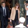 Nicolas Sarkozy et sa femme Carla Bruni-Sarkozy quittent l'hôtel Fairmont Monte-Carlo à Monaco le 18 juin 2014 où l'ancien président a donné une conférence lors du Deloitte World Meet.