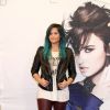 Demi Lovato, les cheveux bleus, lors d'une conférence de presse pour promouvoir son nouvel album à Mexico, le 11 octobre 2013. 
