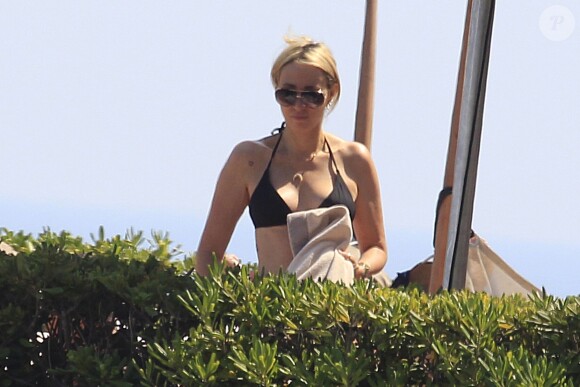 Exclusif - Tish Cyrus, maman de Miley, sur le balcon de son hôtel à Barcelone, le 14 juin 2014.