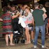 Coleen Rooney à la sortie du restaurant Sushi Leblon à Rio de Janeiro le 21 juin 2014 avec son petit Klay dans les bras et entourée de sa famille