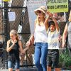 Heidi Klum se promène avec ses enfants Leni, Henry et Lou à New York, le 29 juin 2014. La famille s'est rendue au Musée d'Histoire Naturelle avant d'aller déjeuner au restaurant "Isabella".