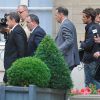 Nicolas Sarkozy arrive accompagné de Michel Gaudin pour recevoir le prix de l'Appel du 18 juin décerné par Rudolph Garnier président du mouvement gaulliste "Union des Jeunes pour le Progrès" (UJP) lors d'une cérémonie à l'assemblée nationale à Paris, le 25 juin 2014.