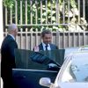 Nicolas Sarkozy quitte son domicile à Paris, le 2 juillet 2014.