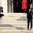 Ayem Nour arrive au Salon de la chambre de commerce et d'industrie pour assister au défilé haute couture Versace automne-hiver 2014-2015. Paris, le 6 juillet 2014.