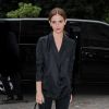 Emma Watson arrive au Grand Palais pour assister au défilé haute couture Giambattista Valli. Paris, le 7 juillet 2014.