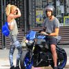 Le top Candice Swanepoel et son compagnon Hermann Nicoli arrivent à la salle de gym le 9 juillet 2014 à New York