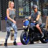 Le top Candice Swanepoel et son compagnon Hermann Nicoli arrivent à la salle de gym le 9 juillet 2014 à New York