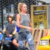 Le top Candice Swanepoel et son compagnon Hermann Nicoli arrivent à la salle de gym le 9 juillet 2014 à New York