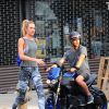 Le top Candice Swanepoel et son compagnon Hermann Nicoli arrivent à la salle de gym le 9 juillet 2014 à New York