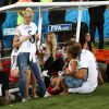 Sami Khedira et sa belle Lena Gercke le 13 juillet 2014 à l'issue de la victoire allemande en finale de Coupe du monde face à l'Argentine au stade Maracanã de Rio de Janeiro