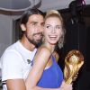Sami Khedira et Lena Gercke lors de la soirée célébrant la victoire de l'équipe allemande en finale de la Coupe du monde face à l'Argentine, à l'hôtel Sheraton de Rio, le 13 juillet 2014