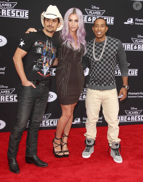 Brad Paisley, Kesha, Ludacris à la première du film "Planes 2 : Fire & Rescue" à Hollywood, le 15 juillet 2014.