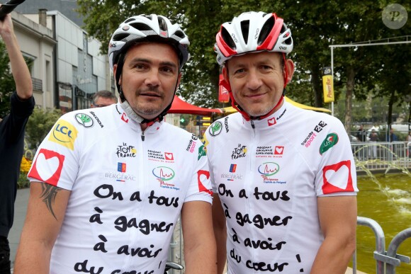Exclusif - Richard Virenque et Dany Boon sur la 20e étape du Tour de France lors de l'Etape du Coeur pour le compte de l'association Mécénat Chirurgie Cardiaque à Périgueux le 26 juillet 2014.