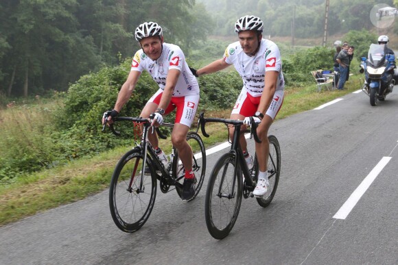 Exclusif - Patrick Poivre d'Arvor, Richard Virenque sur la 20e étape du Tour de France lors de l'Etape du Coeur pour le compte de l'association Mécénat Chirurgie Cardiaque à Périgueux le 26 juillet 2014.