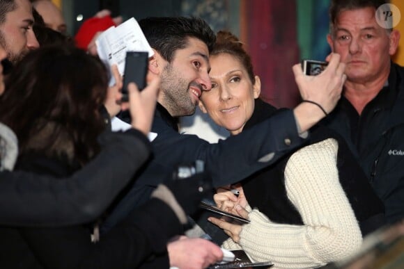 Celine Dion et sa famille à la sortie de leur hôtel à Paris, le 7 décembre 2013.