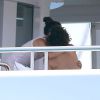 Orlando Bloom et Erica Packer à bord d'un yacht en vacances à Ibiza, le 31 juillet 2014.
