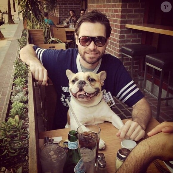 Michael Johns et son chien Puddy en juin 2014.