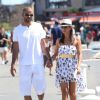 Tony Parker et sa fiancée Axelle Francine se promènent main dans la main pendant leurs vacances à Saint-Tropez, le 20 août 2013.