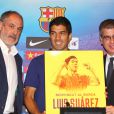  Le joueur de football uruguayen Luis Suarez a d&eacute;voil&eacute; son nouveau maillot de l'&eacute;quipe du FC Barcelone, lors d'une conf&eacute;rence de presse au Camp Nou &agrave; Barcelone le 19 ao&ucirc;t 2014 