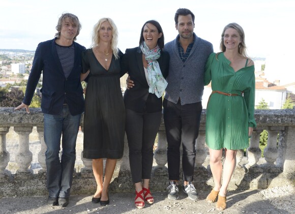 Pascal Demolon, Sandrine Kiberlain, Jeanne Herry, Laurent Lafitte et Olivia Côte posant au photocall du film "Elle l'adore" lors 7ème Festival du Film Francophone d'Angoulême, à Angoulême, le 23 août 2014. 