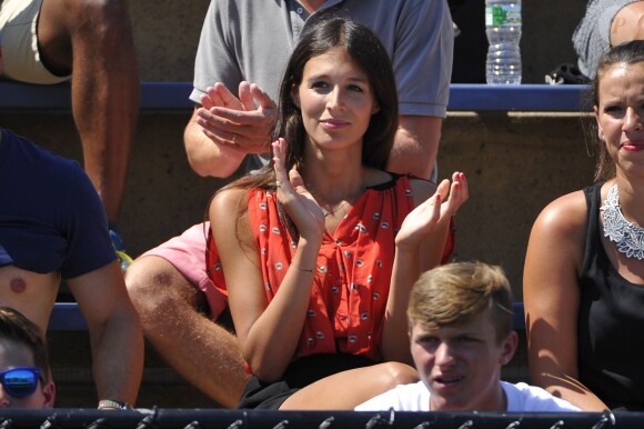 La chanteuse Pauline assiste au match de son compagnon Benoît Paire dans les tribunes de Flushing Meadows à l'occasion de l'US Open, le 25 août 2014