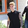 Justin Bieber est allé déjeuner avec un ami à Los Angeles, le 22 août 2014.