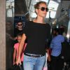 Heidi Klum et ses enfants Leni, Lou et Johan arrivent à l'aéroport de Los Angeles, le 28 août 2014.