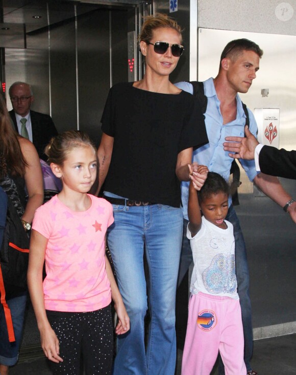 Heidi Klum et ses enfants Leni, Lou et Johan à l'aéroport de Los Angeles en provenance de New York, le 28 août 2014.