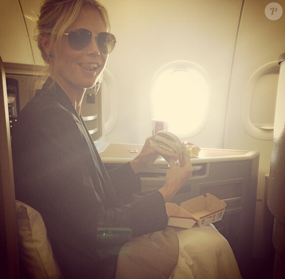 Heidi Klum a publié une photo d'elle en train de dévorer un burger, le 24 août 2014.