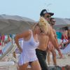 Pamela Anderson et Rick Salomon profitent de la plage à Miami Beach, le 5 septembre 2014.