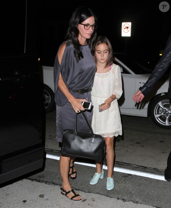 Courteney Cox, sa fille Coco Arquette et son compagnon Johnny McDaid à West Hollywood. Le 10 septembre 2014.