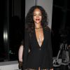 Rihanna assiste au défilé Altuzarra, habillée d'une veste noire à franges et décolletée Altuzarra (collection crosière 2015) et de sandales Manolo Blahnik. New York, le 6 septembre 2014.