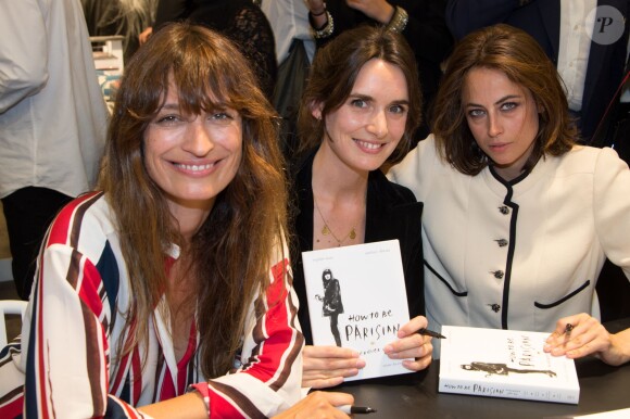Caroline de Maigret, Sophie Mas et Anne Berest dédicacent leur livre "How to Be Parisian Wherever You Are" chez colette. Paris, le 16 septembre 2014.