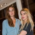  Louise Basilien et Ana&iuml;s Vandevyvere du groupe Les Plastiscines mixent dans la boutique Galliano lors de la Vogue Fashion Night Out 2014. Paris, le 16 septembre 2014. 