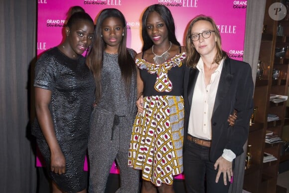 L'équipe du film "Bande de filles": Mariétou Touré, Karidja Touré, Assa Sylla, et la réalisatrice Céline Sciamma - Soirée du "Grand Prix Elle Cinéma 2014" à Paris le 18 septembre 2014.