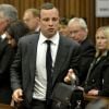 Oscar Pistorius et June Steenkamp lors du procès du premier pour le meurtre de Reeva Steenkamp, le 3 mars 2014 à Pretoria