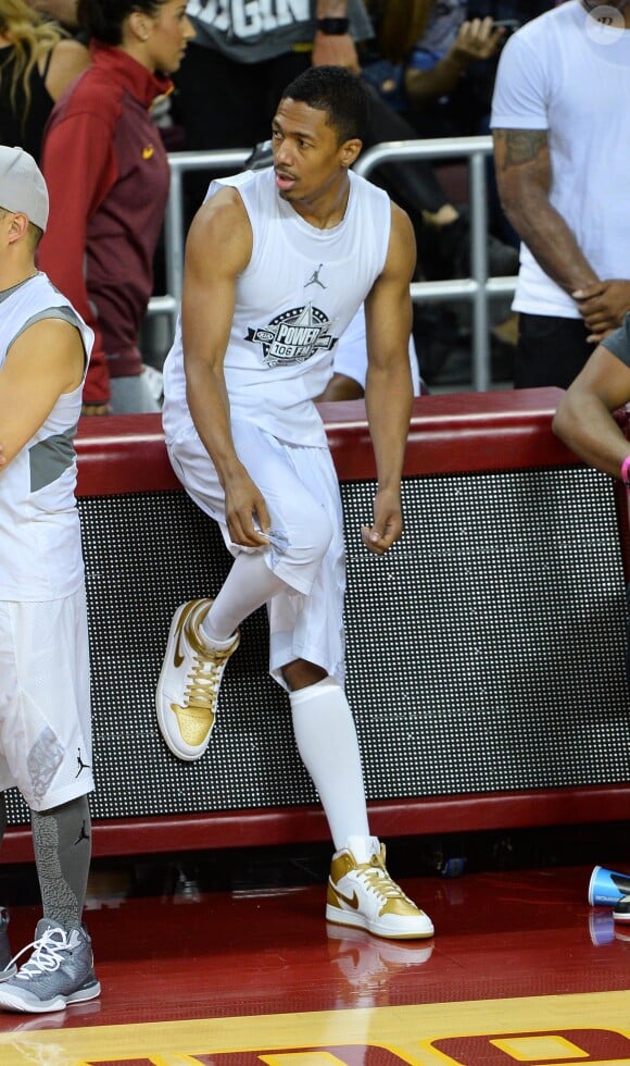 Nick Cannon participe au match de basket-ball caritatif Power 106 All-Star à l'USC Galen Center. Los Angeles, le 21 septembre 2014.