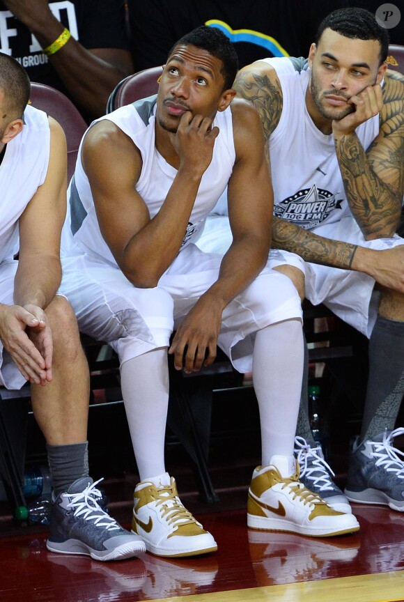 Nick Cannon participe au match de basket-ball caritatif Power 106 All-Star à l'USC Galen Center. Los Angeles, le 21 septembre 2014.