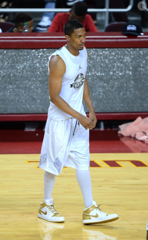 Nick Cannon participe au match de basket-ball caritatif Power 106 All-Star à l'USC Galen Center. Los Angeles, le 21 septembre 2014.
