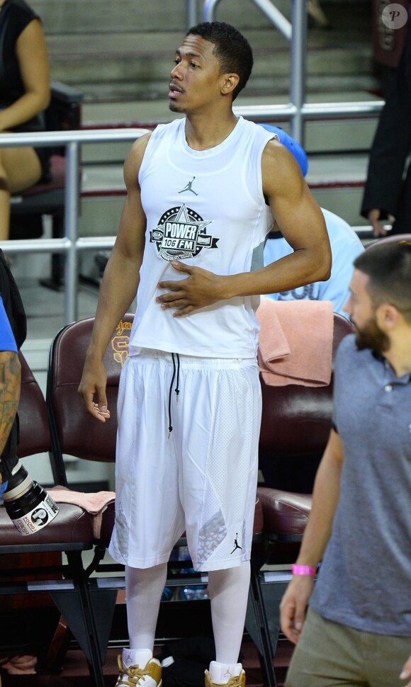 Nick Cannon participe au match de basket-ball caritatif Power 106 All-Star à l'USC Galen Center. Los Angeles, le 21 septembre 2014.