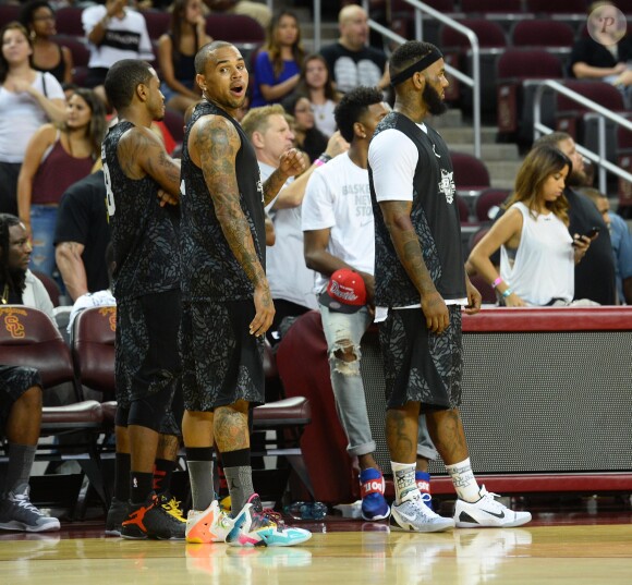 Trey Songz, Chris Brown et The Game lors du match de basket-ball caritatif Power 106 All-Star à l'USC Galen Center. Los Angeles, le 21 septembre 2014.