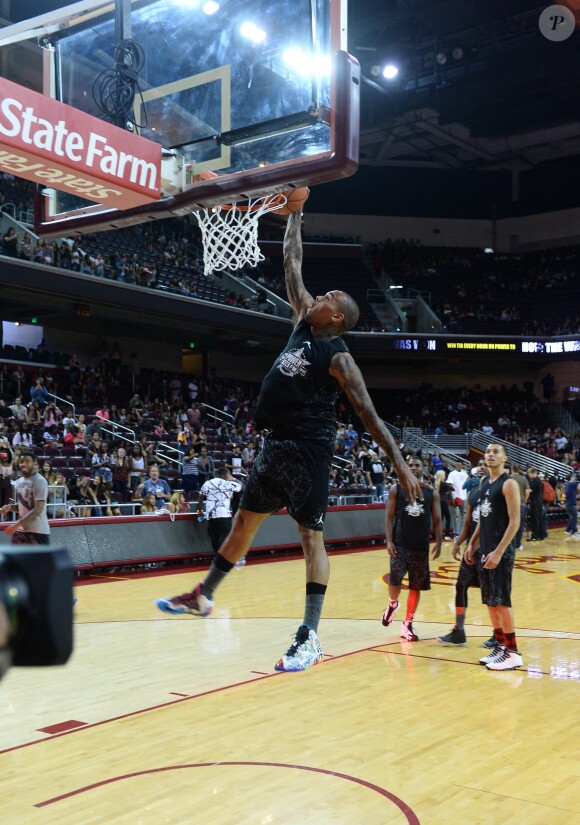 Chris Brown participe au match de basket-ball caritatif Power 106 All-Star à l'USC Galen Center. Los Angeles, le 21 septembre 2014.