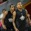 Trey Songz et Chris Brown lors du match de basket-ball caritatif Power 106 All-Star à l'USC Galen Center. Los Angeles, le 21 septembre 2014.