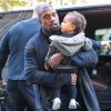 Kanye West et sa fille North arrivent au Royal Monceau. Paris, le 24 septembre 2014.