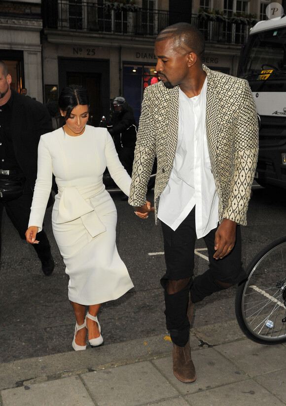 Kanye West et sa femme Kim Kardashian vont dîner au restaurant Hakkasan à Londres, le 23 septembre 2014.