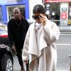 Kim Kardashian et Kanye West arrivent au siège de Pierre Balmain, situé rue Pierre Charron à Paris. Le 24 septembre 2014.